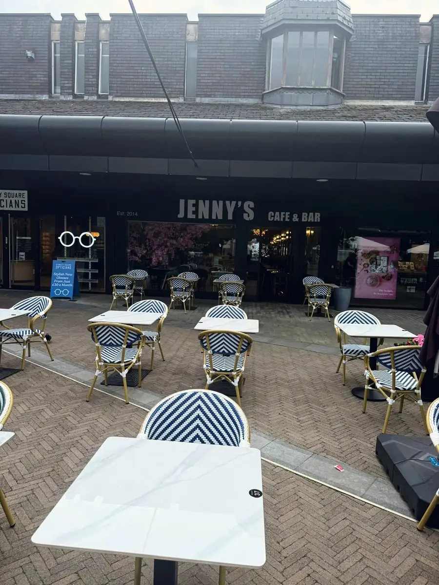 Striped bistro chairs out on Stanley Square