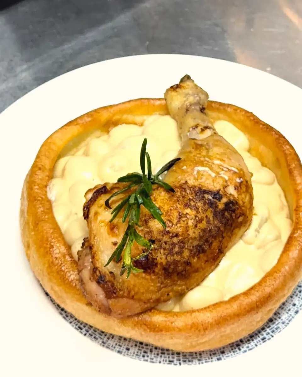 Roast chicken with rosemary in a Yorkshire pudding